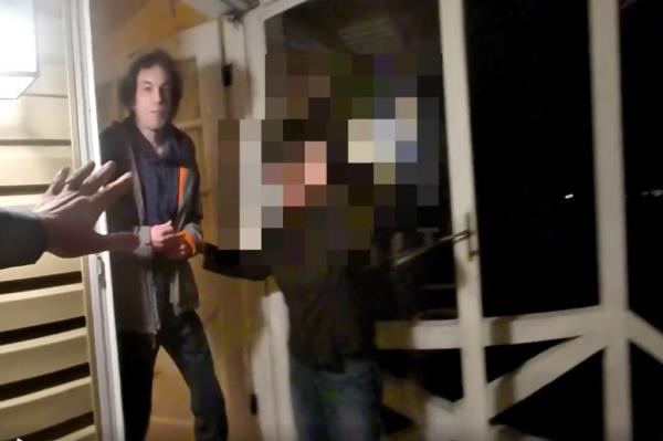 Keith Kiminski lunged at the officer with a knife after his mother opened the door.