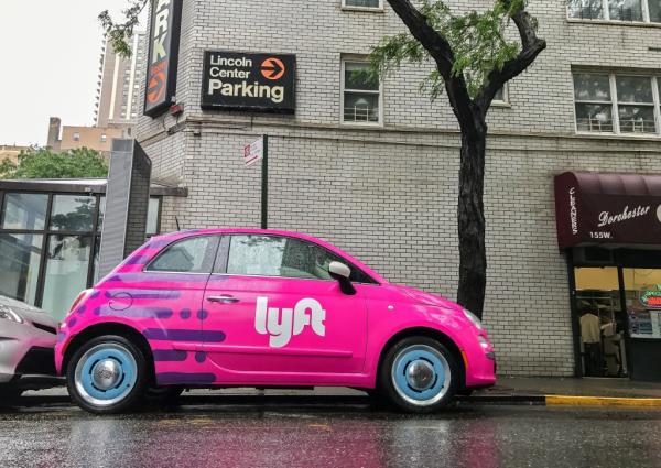 Pink Fiat 500 with a Lyft logo parked on the streets of Manhattan on May 25, 2017.