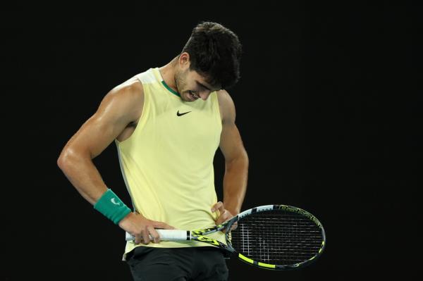 Carlos Alcaraz reacts during his Australian Open loss to Alexander Zverev on Jan. 24, 2024.