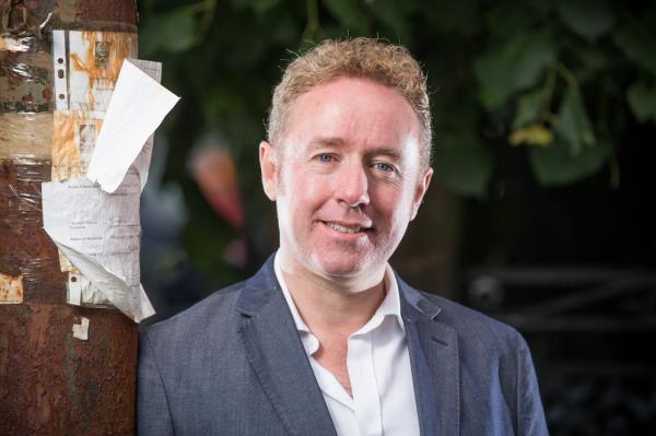 Mark Millar smiling. 
