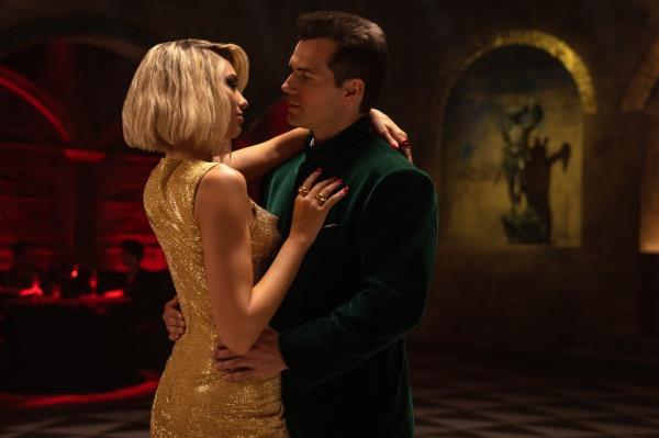 Dua Lipa and Henry Cavill in a scene from 