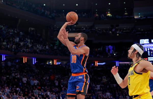 Knicks guard Alec Burks #18 puts up a shot during the second quarter.
