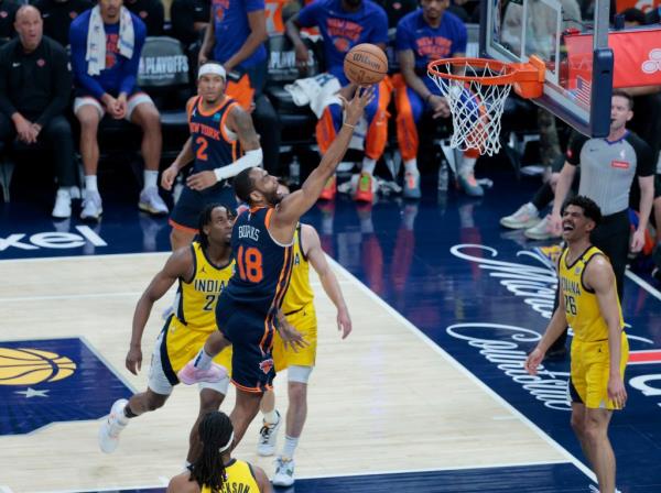 Alec Burks #18 of the New York Knicks goes up for a shot during the second quarter.