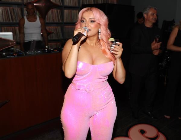 Rexha speaks during her 