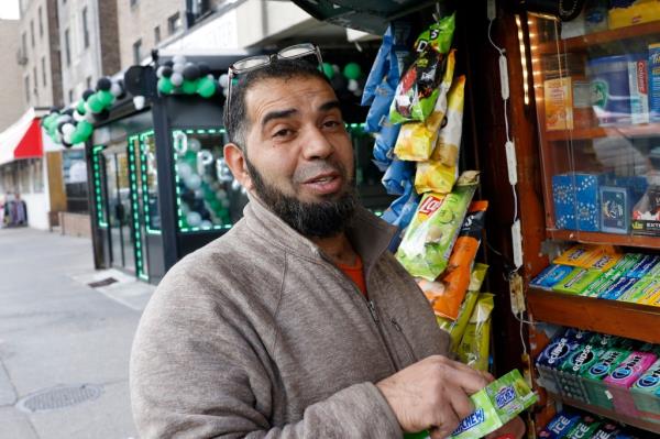 Alex who runs a newspaper stand on 80th Road and Queens Boulevard 