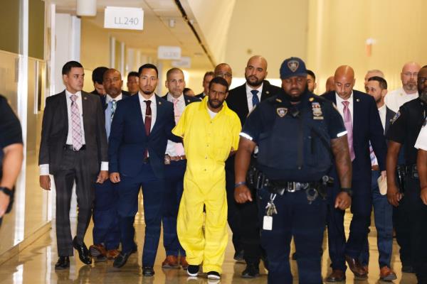 Felix Garcia being escorted into federal court on Thursday for his arraignment. 