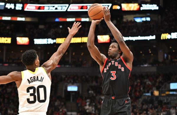 OG Anunoby (3) shoots the ball over Utah Jazz guard Ochai Agbaji (30) in the first half at Scotiabank Arena.