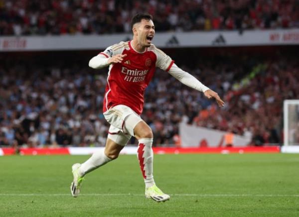 Soccer Football - Premier League - Arsenal v Manchester City - Emirates Stadium, London, Britain - October 8, 2023 Arsenal's Gabriel Martinelli celebrates scoring their first goal REUTERS/David Klein NO USE WITH UNAUTHORIZED AUDIO, VIDEO, DATA, FIXTURE LISTS, CLUB/LEAGUE LOGOS OR 'LIVE' SERVICES. o<em></em>nLINE IN-MATCH USE LIMITED TO 45 IMAGES, NO VIDEO EMULATION. NO USE IN BETTING, GAMES OR SINGLE CLUB/LEAGUE/PLAYER PUBLICATIONS.