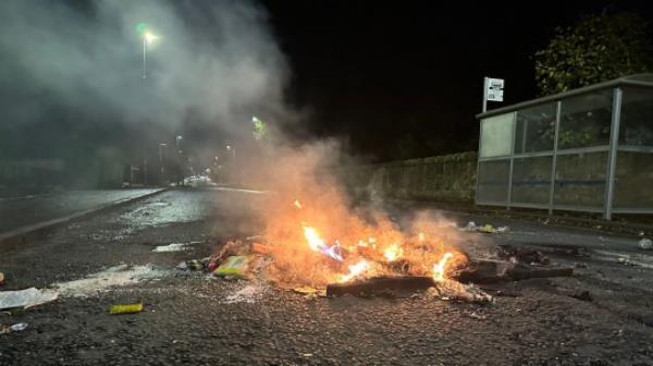 The scene in the Niddrie area of Edinburgh on Saturday night after a serious disturbance, which echoed scenes seen in Dundee earlier this week, with police urging people to stay indoors. A road was blockaded with fire and motorbikes raced through part of the Scottish capital amid scenes of Bo<em></em>nfire Night chaos. Picture date: Saturday November 5, 2022. PA Photo. See PA story POLICE Niddrie. Photo credit should read: Dan Barker/PA Wire