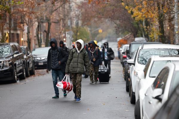 In the early morning of December 2, hundreds of migrants arrive during the night while most are sleeping, to a shuttered Catholic School on the Lower East Side, Saint Brigid's, at 185 East 7 Street, to be first in line for housing and food