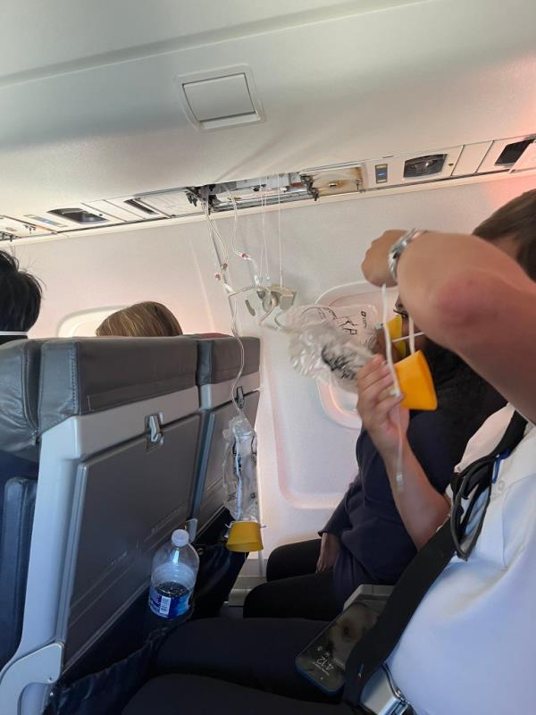 Oxygen masks were dro<em></em>pped from the overhead due to the rapid lost in altitude.