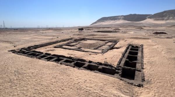 The tomb complex of Queen Meret-Neith in Abydos during excavation. The Queen's burial chamber lies in the centre of the complex and is surrounded by the seco<em></em>ndary tombs of the courtiers and servants. See SWNS story SWSCwine. Sealed jars of wine from 5,000 years ago have been uncovered in an Egyptian Queen's tomb. The find, one of the oldest ever, was amo<em></em>ngst grave goods for Queen Meret-Neith in Abydos, from 3,000 BC. The researchers from the University of Vienna say she was the most powerful woman in the period and possibly the first female pharaoh of ancient Egypt. Queen Meret-Neith was the o<em></em>nly woman to have her own mo<em></em>numental tomb in Egypt's first royal cemetery at Abydos.
