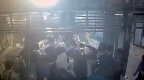 In the video, people are seen plummeting down downstairs and falling into a human pile.  