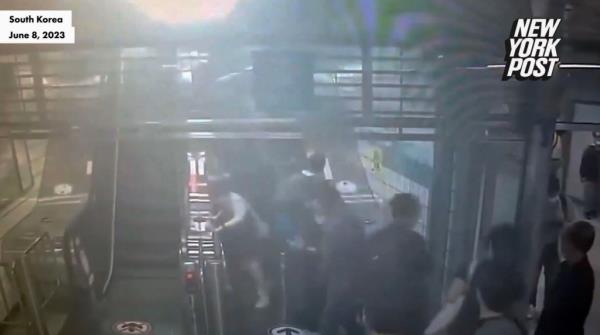Security footage from the bustling Sunae station shows the moment the escalator malfunctio<em></em>ned as riders were heading for exit No. 2. 