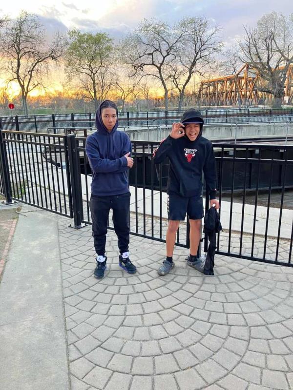 Amari with his brother.