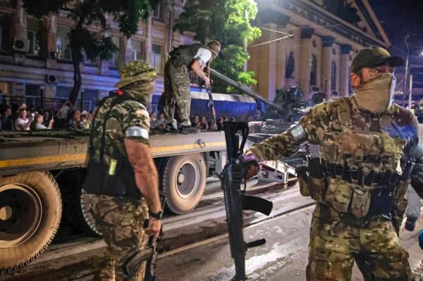 Members of the Wagner Group military company guard are pictured  in Rostov-on-Don, Russia on June 24, 2023