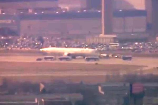 The plane was evacuated o<em></em>nce it touched down in Chicago on Wednesday. 