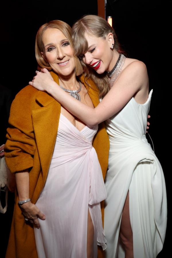 Celine Dion and Taylor Swift hugging. 