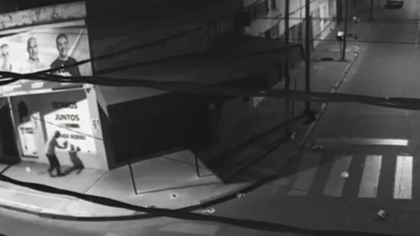The arso<em></em>nist seen on CCTV video dousing the office of Leandro Ugartemendia with a flammable liquid and setting it on fire 