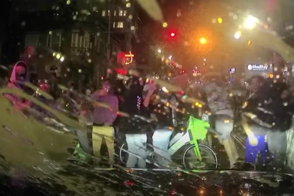 Crowd in Seattle gathering at an illegal event. 