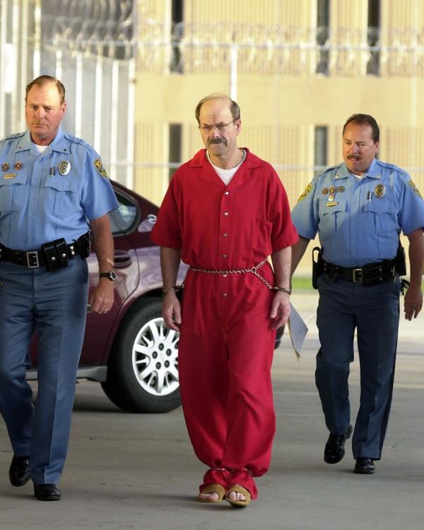 Dennis Rader (center) was arrested in 2005.