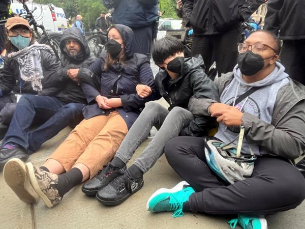 Protesters lock arms on Penn campus as police clear the encampment showing support for Palestinians in Gaza.