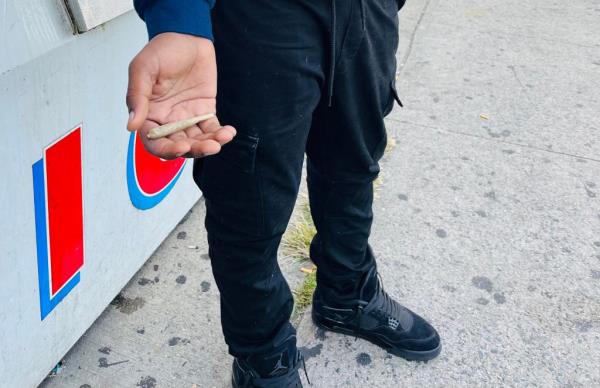 Student with joint in hand before headng to school.