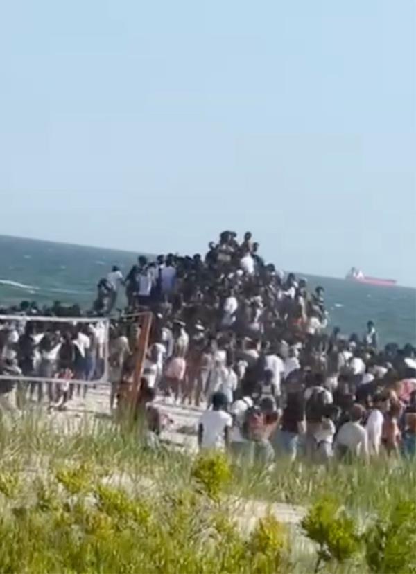 People crowd beach