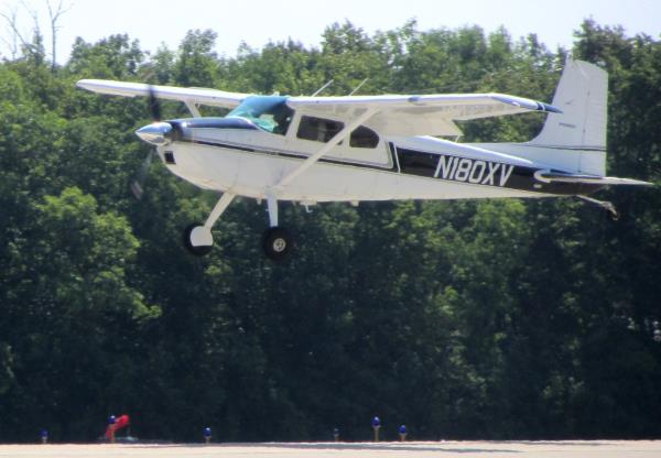 Arnold was arrested three times in October for allegedly flying the small plane over 42-year-old Cassie Wilusz's house and taking photos of her property. 