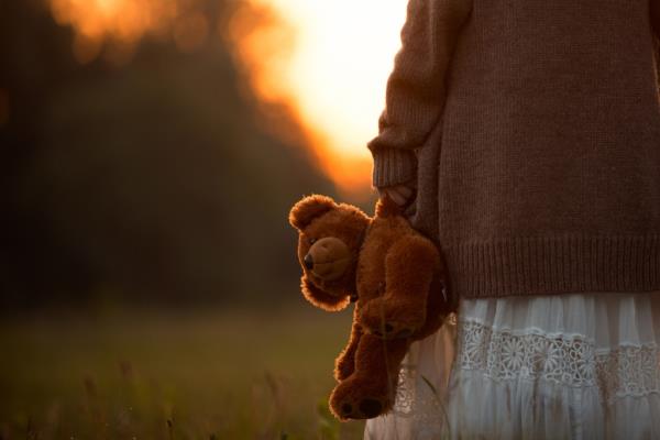 File photo of a child with a teddy