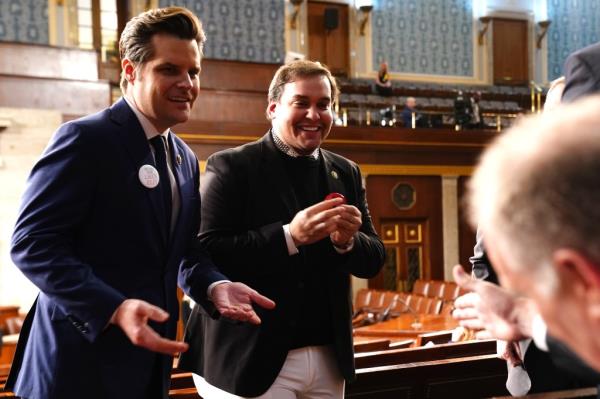 Rep. Matt Gaetz (R-FL) (L) talks with ousted Republican Rep. George Santos of New York ahead of the annual State of the Unio<em></em>n address by President Joe Biden during a joint session of Co<em></em>ngress in the House chamber at the Capital building on March 7, 2024 in Washington, DC. 