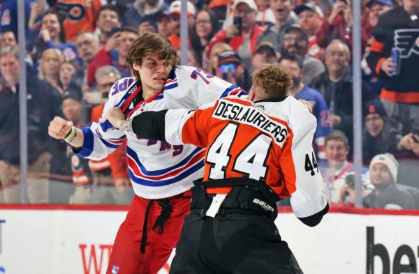 Nicolas Deslauriers #44 of the Philadelphia Flyers fights Matt Rempe #73 of the New York Rangers during the first period at the Wells Fargo Center on February 24, 2024 in Philadelphia, Pennsylvania.