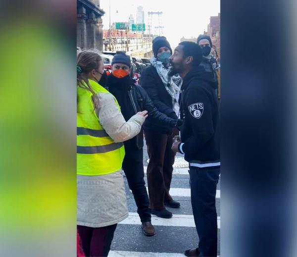 The driver warned the protestors that he was a<em></em>bout to 