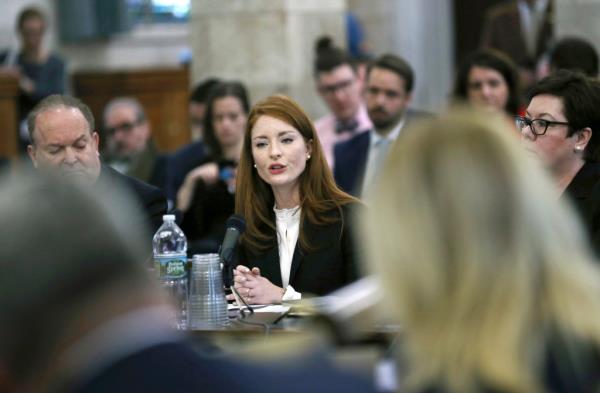 Katie Brennon speaking at a hearing.