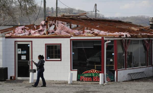 A tornado ripped the roof off this pizza shop after it plowed its way through the town of Milton.