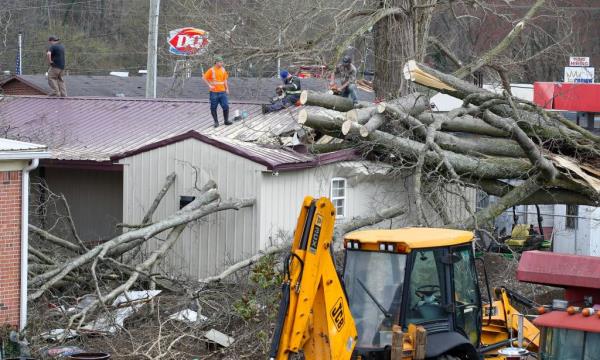 Crews work to clean up after a tornado touched down on Thursday, March 14, 2024, in Milton, Kentucky.