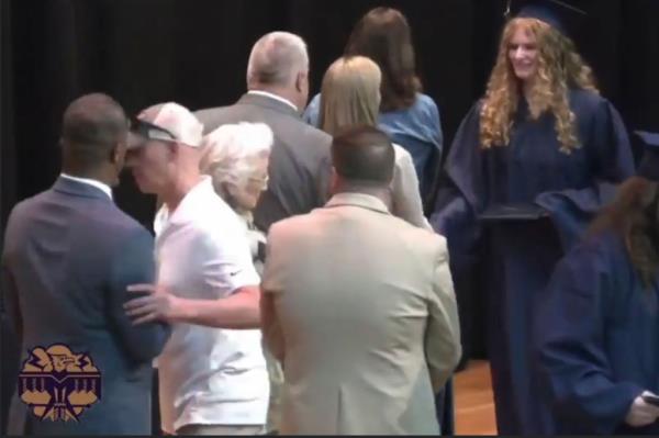 The father of a graduate at Baraboo High School in Wisco<em></em>nsin rushed to the stage as his daughter was walking across to receive her diploma, and forcibly pushed the district's superintendent away from the ceremony as she approached him