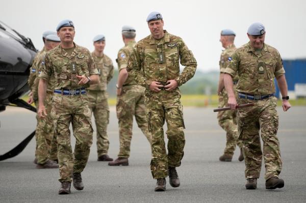 Prince William speaks to service perso<em></em>nal at the Army Aviation Centre in Middle Wallop, England, Monday, May 13, 2024.
