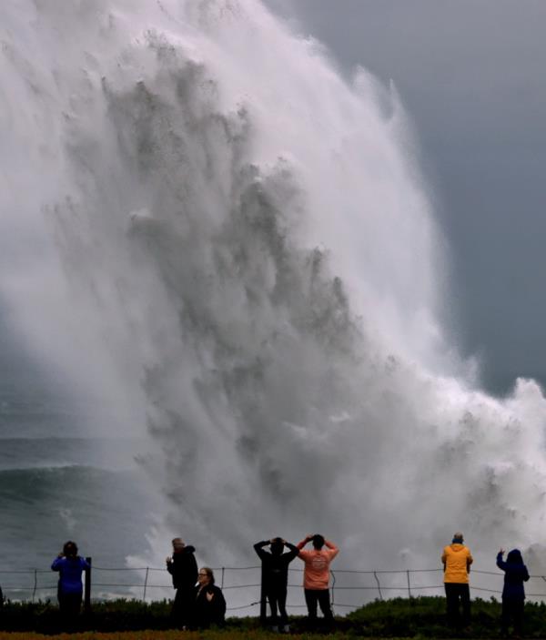 Large waves crash in to Duncan's Landing north of Carmet on Dec. 28, 2023 due to a Pacific storm pummeling Northern California.