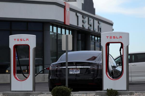 A Tesla electric car charging at a station in Salt Lake City, Utah.