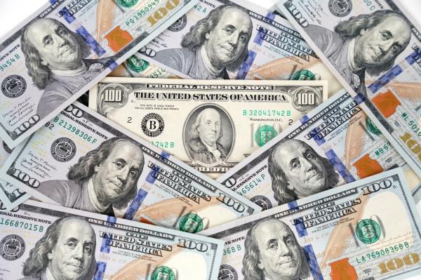 Hundred dollar bills scattered