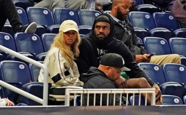 LeBron James and his wife Savannah James watch their son Bro<em></em>nny James participate in the 2024 NBA Draft Combine at Wintrust Arena on May 15, 2024. 