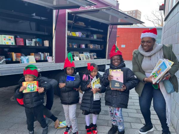 Visitors at Saturday's book giveaway in the Bronx