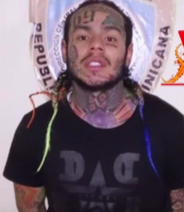 Tekashi 6ix9ine is pictured in a previous mugshot