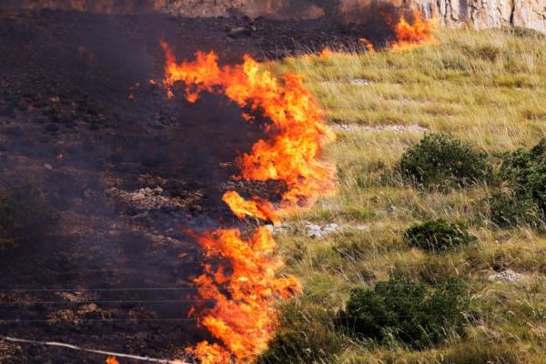 Flames burn in Italy
