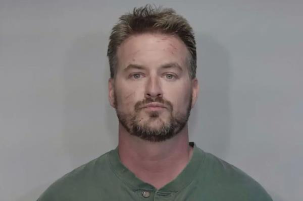 Boston Heights Police Chief Chad McArdle, 40, was charged with misdemeanor-level battery in Florida. 