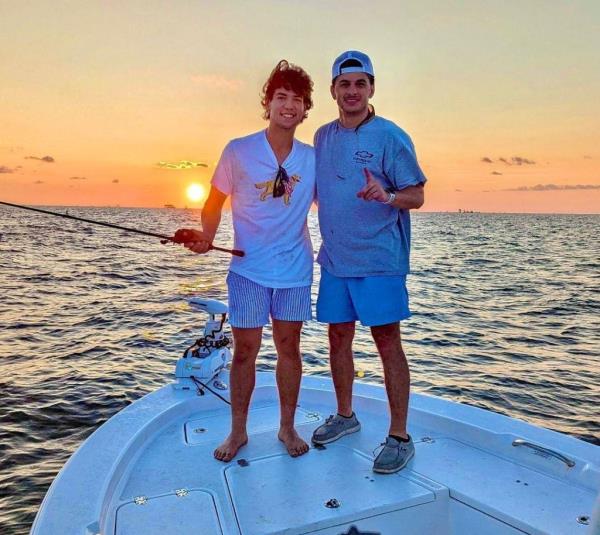 Cameron Robbins, 18, left, with his brother, Cole.