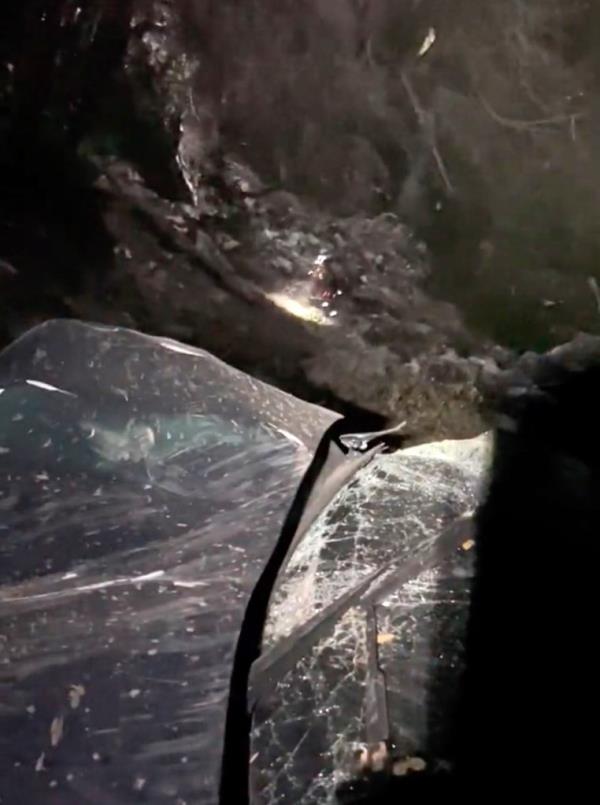 The driver was found ejected from the destroyed car, with the crash setting off his iPhone.