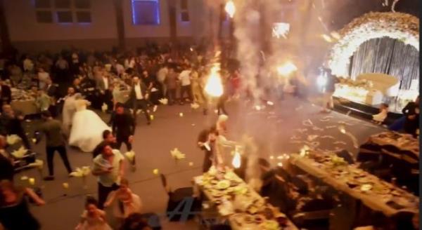 Uncleared Grabs- Terrifying new video shows panic breaking out inside Iraqi wedding hall