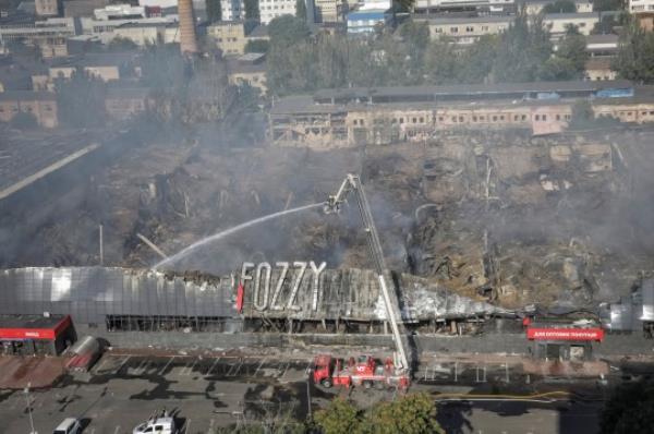 Rescuers work at a site of a shopping mall destroyed during a Russian military strike, amid Russia's attack on Ukraine, in Odesa, Ukraine August 14, 2023. REUTERS/Nina Liashonok